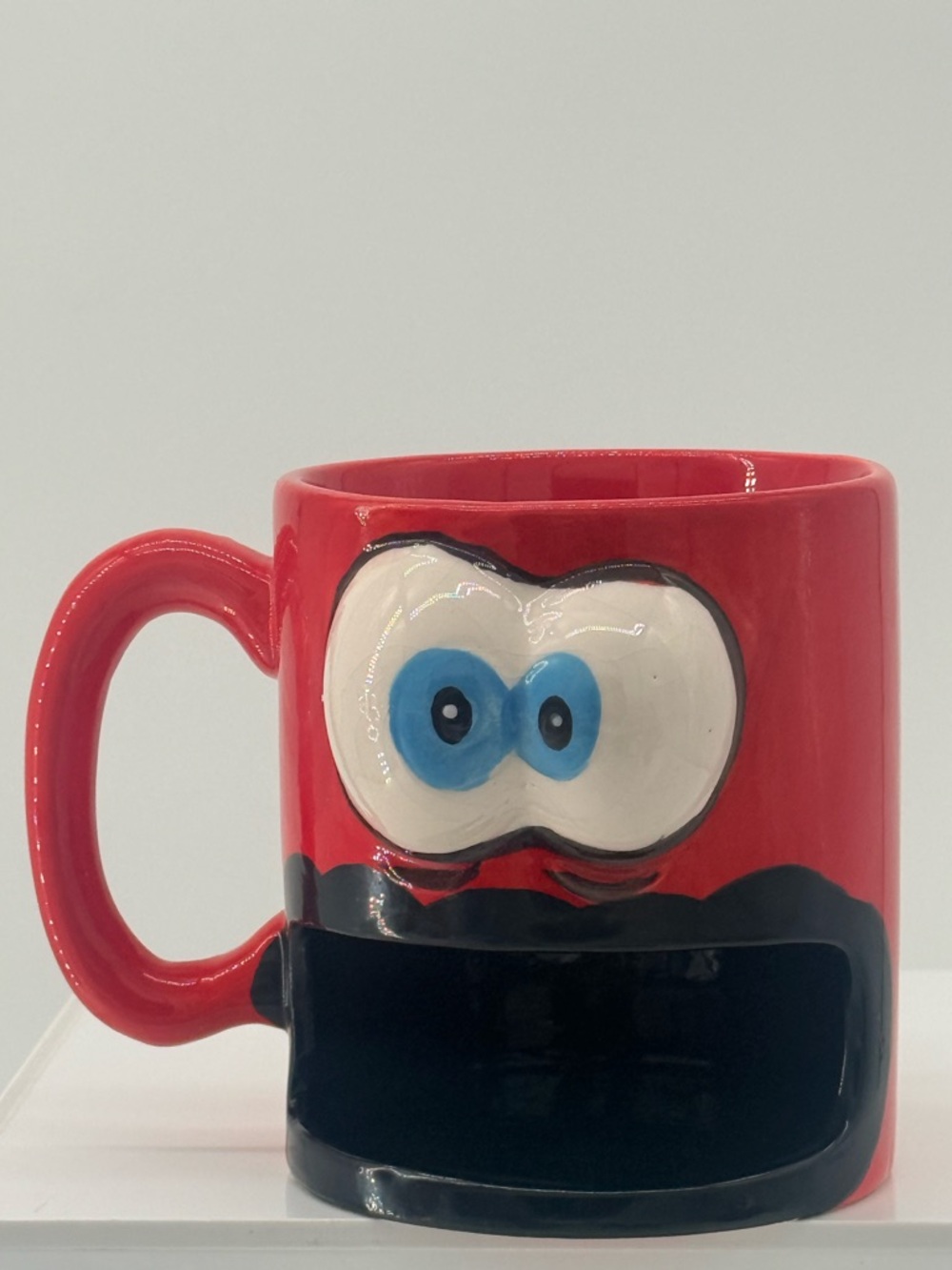 Red Ceramic Eye Mug with Built-In Front Slot